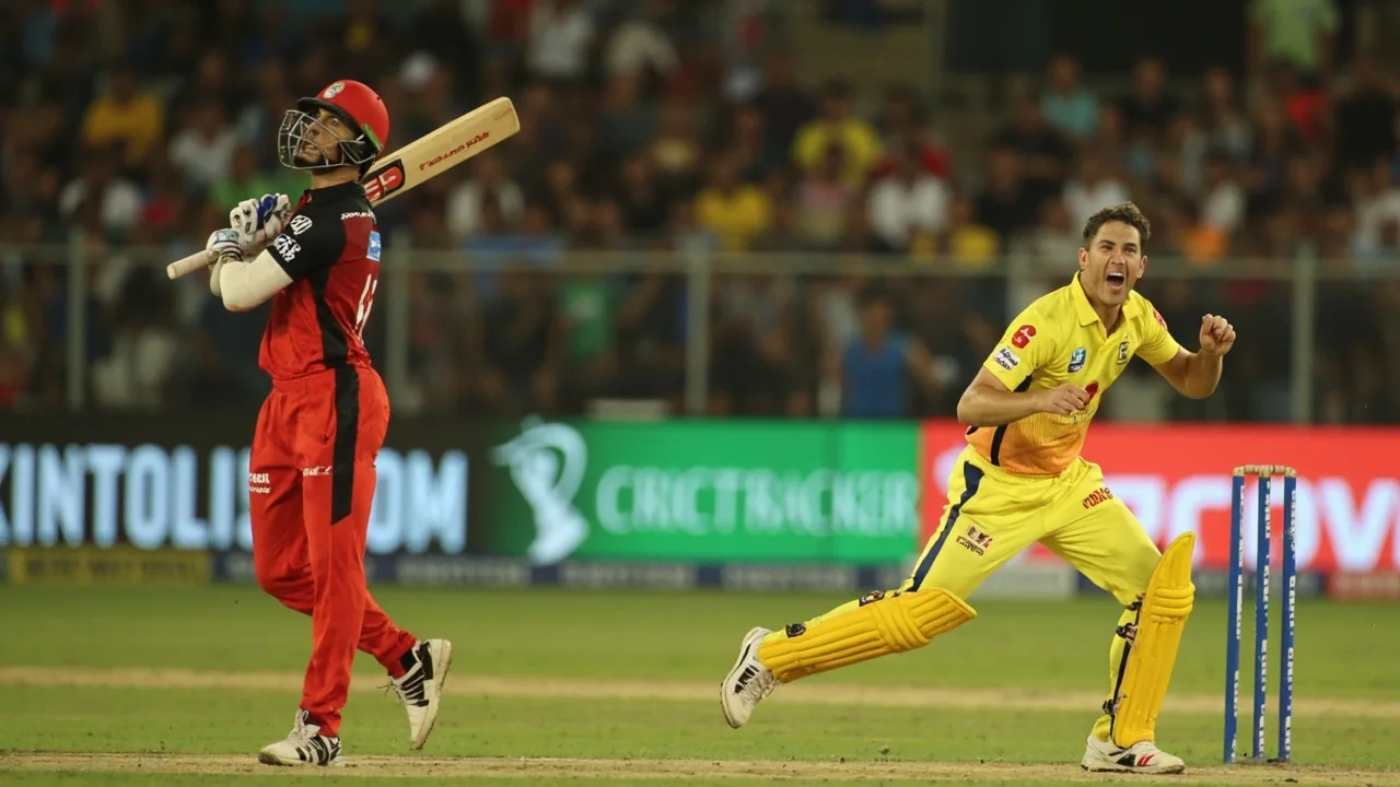 Wide view of the Ekana Cricket Stadium in Lucknow under evening floodlights, with players spread across the field during an IPL fixture